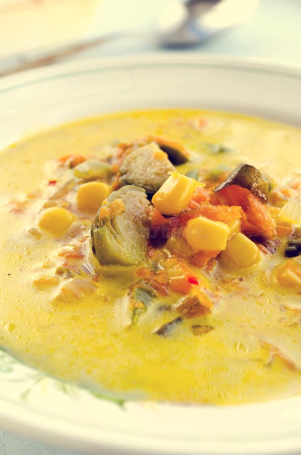 Corn soup with brussels sprouts and other vegetables stock images Corn soup with brussels sprouts and other vegetables stock images