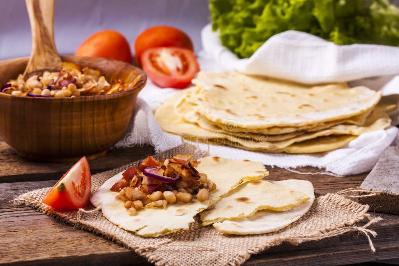 Corn tortilla with bacon stock photo. Image of grilled 61306256