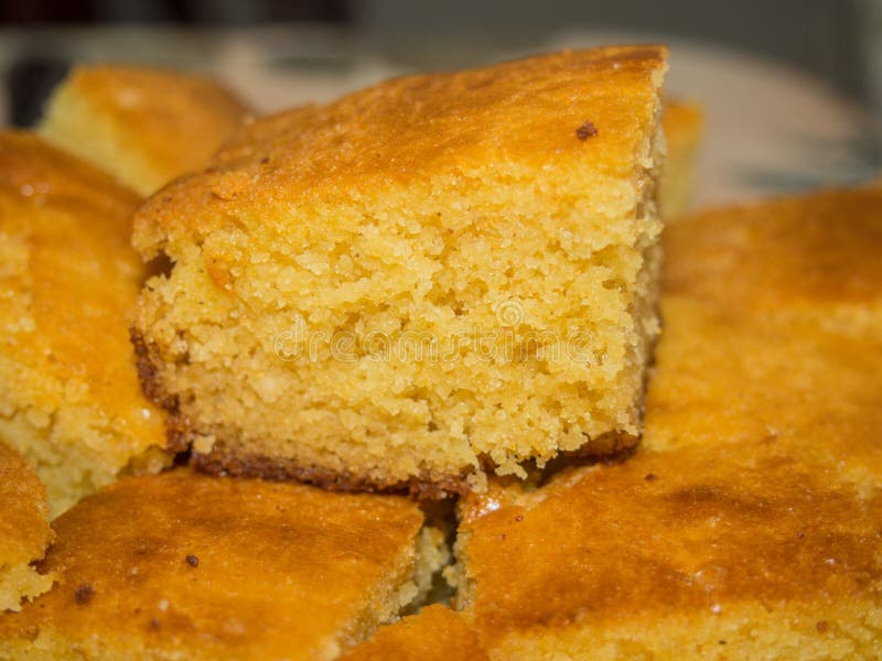 Cornbread is a generic name for any number of quick breads containing cornmeal. They are usually leavened by baking powder.