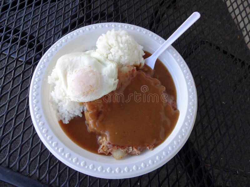 Corned Beef Hash with Gravy, Over Easy Egg and Rice Stock Photo Image
