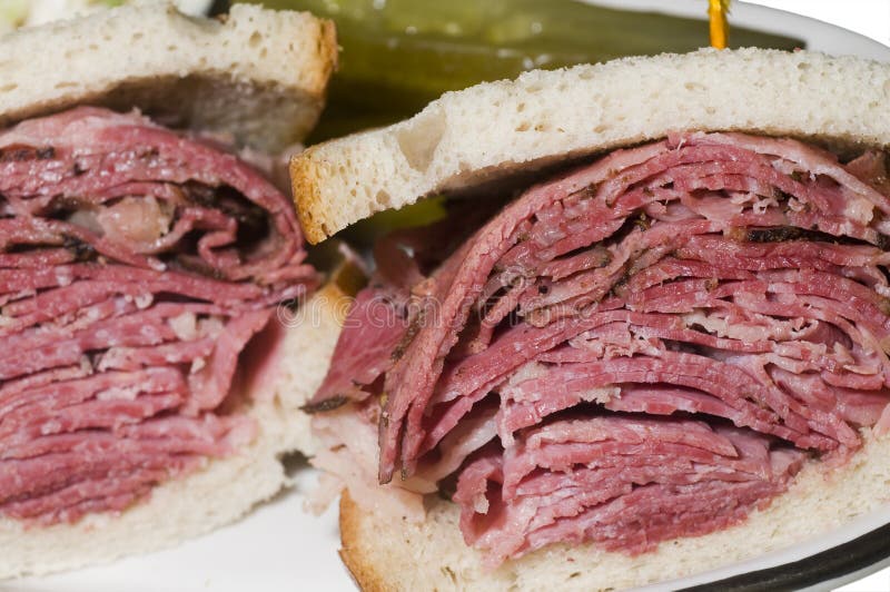 Corned beef and pastrami combination sandwich on jewish rye bread at new york delicatessen kosher restaurant. Kosher stock images, royalty-free photos and pictures