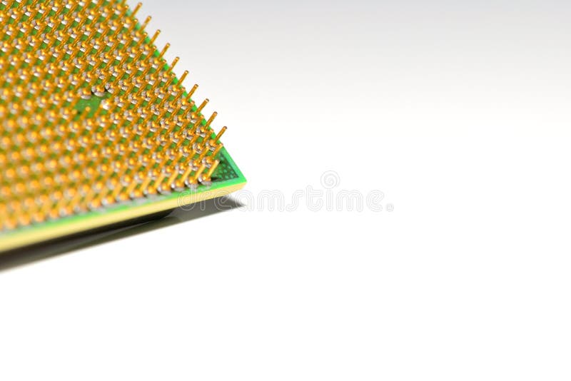 Corner of central processor unit. Golden pins of a core. Copy space. Shallow depth of field stock images