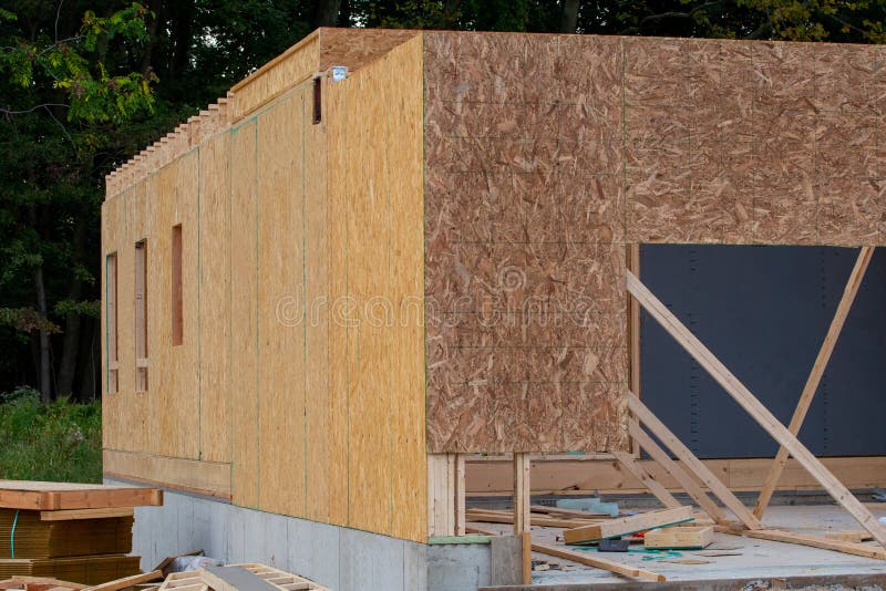 Corner of the Construction Site of a New Plywood House Stock Photo