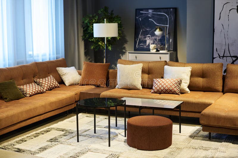 Corner of coworking area with soft comfortable couches with cushions stock photos