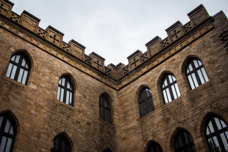 Corner of an old outside Castle Wall with Windows