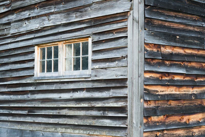 Corner Of Weathered Barn Wall With Windows And Rustic Wood ...