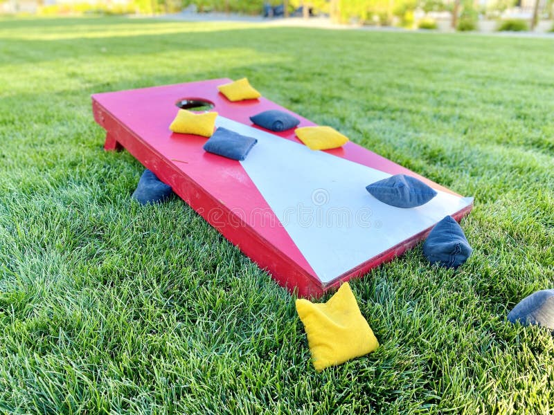 Cornhole Board with Bean Bags on Lawn Stock Photo Image of lawn