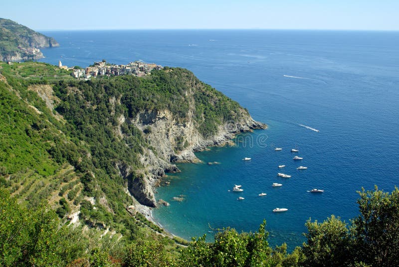 View of Corniglia and Ligurian Sea (the Mediterranean), Cinque Terre National Park, Italy. View of Corniglia and Ligurian Sea (the Mediterranean), Cinque Terre National Park, Italy.