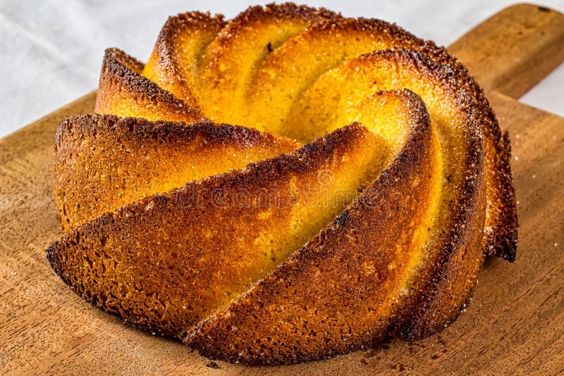 Cornmeal Cake. Typical Brazilian Cornmeal Cake on Wooden Cutting Board