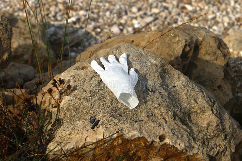 After the coronavirus, there are many abandoned protective equipment on the streets and beaches in Israel. After the coronavirus on the streets and beaches in royalty free stock images After the coronavirus, there are many abandoned protective equipment on the streets and beaches in Israel. After the coronavirus on the streets and beaches in royalty free stock images