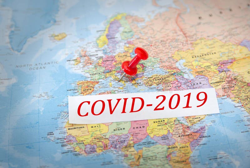 Coronavirus virus danger in Italy .Covid-19 disease. Italy marked with a pin on a world map. CHOVID 2019 inscription