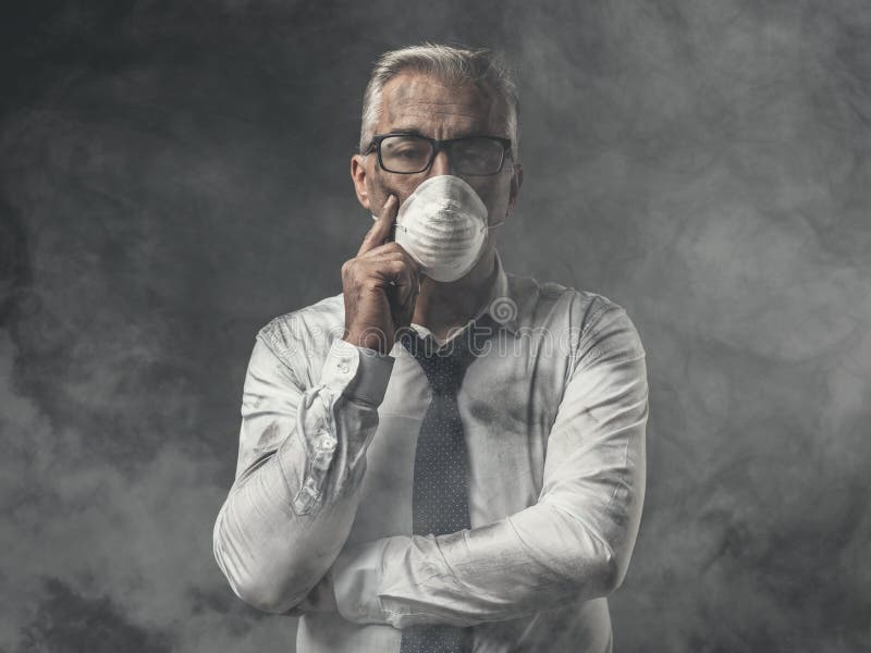 Businessman with mask and air pollution