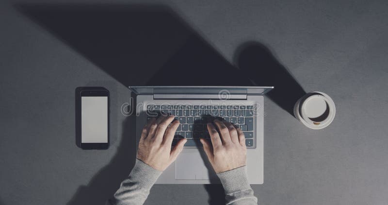 Corporate businessman working on a minimalistic desktop royalty free stock photography