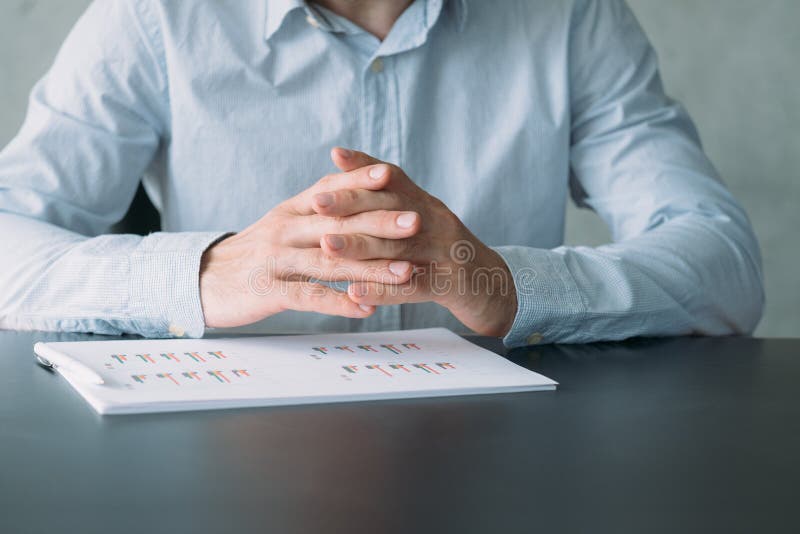 Corporate meeting project manager desk graphs stock photo Corporate meeting project manager desk graphs stock photo