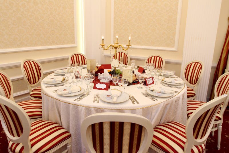 Luxury arrangement of a party table in a corporate events ballroom. Luxury arrangement of a party table in a corporate events ballroom