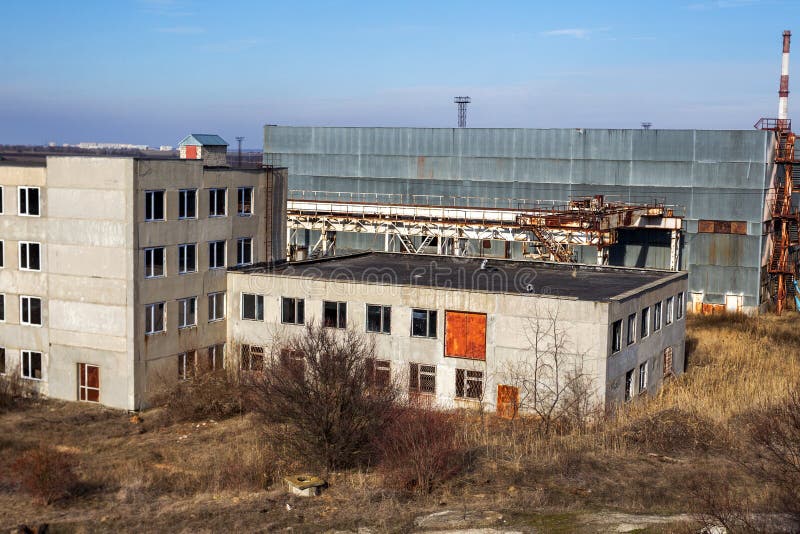 Corps of an old abandoned industrial plant. Abandoned construction of a nuclear power plant in Odessa, Teplodar. Industrial stock photography Corps of an old abandoned industrial plant. Abandoned construction of a nuclear power plant in Odessa, Teplodar. Industrial stock photography