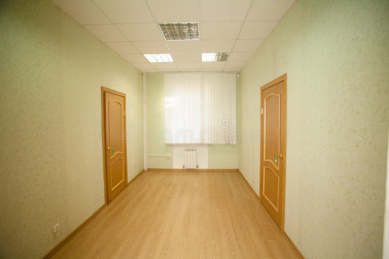 Corridor with wooden doors stock photo. Image of entrance 46107486