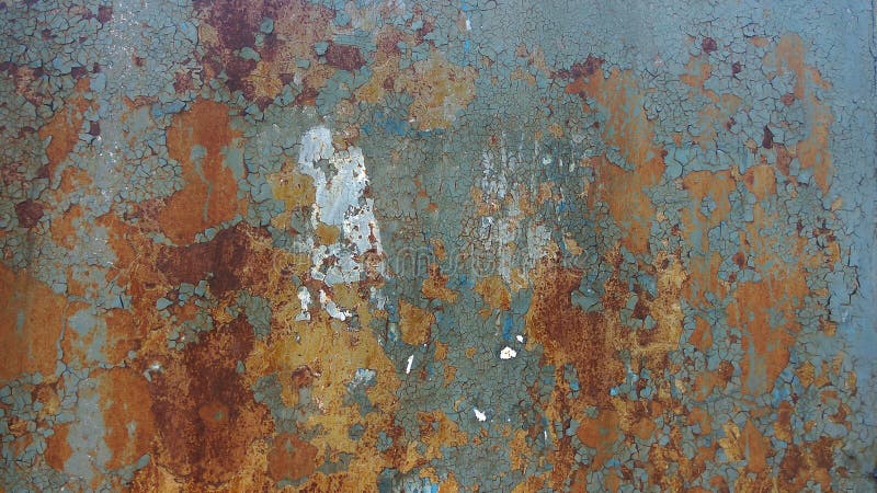 Corroded metal background. Rusty metal background with streaks of rust. Rust stains. Rystycorrosion.