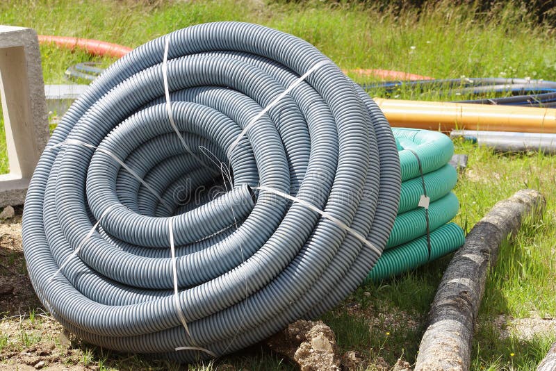 Red Corrugated Plastic Pipes Used for Underground Electrical Lines