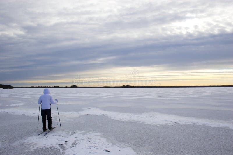 Cross-country winter skiing on the lakeï¿½s ice in Voyager National Park. Cross-country winter skiing on the lakeï¿½s ice in Voyager National Park