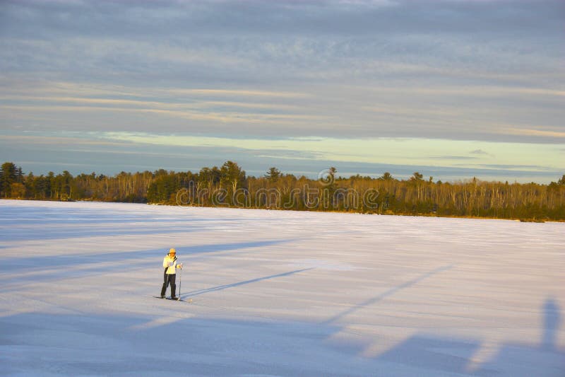 Cross-country winter skiing on the lakeï¿½s ice in Voyager National Park. Cross-country winter skiing on the lakeï¿½s ice in Voyager National Park