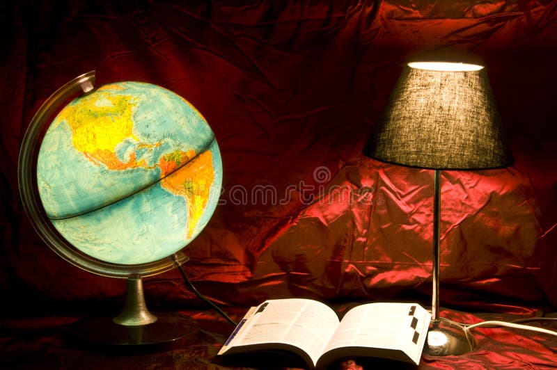 A Map of the world and a guidebook to plan a travel. A Map of the world and a guidebook to plan a travel