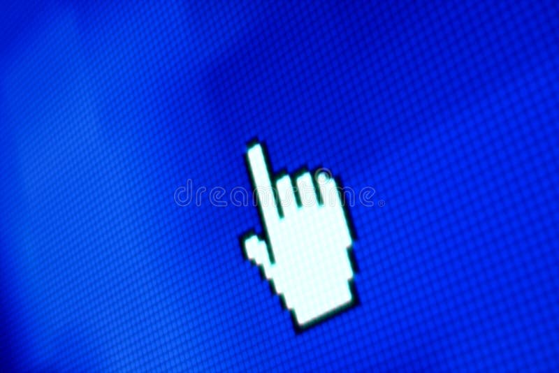 Finger corsor on blue pixel screen. Finger corsor on blue pixel screen