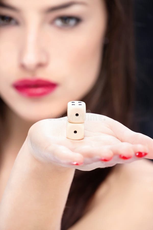 Two dices in young woman's hand. Two dices in young woman's hand
