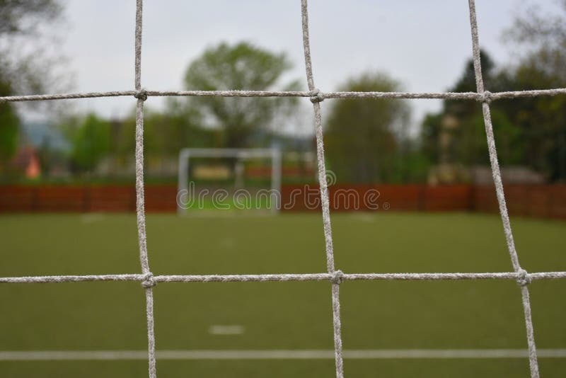 Corte di Futsal dietro rete immagine stock libera da diritti Corte di Futsal dietro rete immagine stock libera da diritti