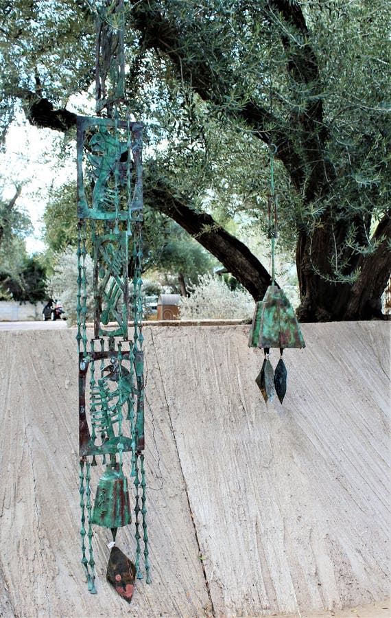 Suspended handcrafted solid bronze outdoor wind chimes from Cosanti Paolo Soleri Studios located in paradise Valley Scottsdale, Arizona, United States. Suspended handcrafted solid bronze outdoor wind chimes from Cosanti Paolo Soleri Studios located in paradise Valley Scottsdale, Arizona, United States