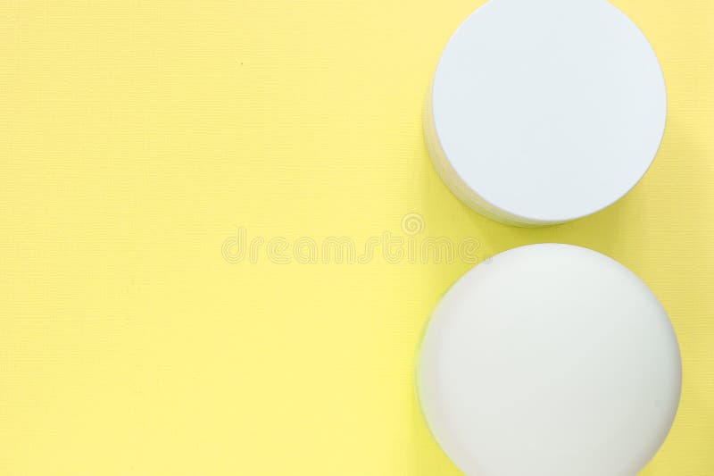 Download Cosmetic Jars On A Yellow Background Health And Beauty Top View Stock Photo Image Of Container Liquid 164514800 Yellowimages Mockups