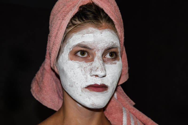 Cosmetic White Face Mask of Toothpaste. Woman in White Cosmetic Mask
