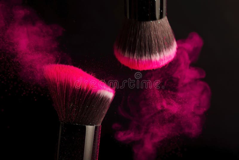 Cosmetics brush and colorful makeup powder