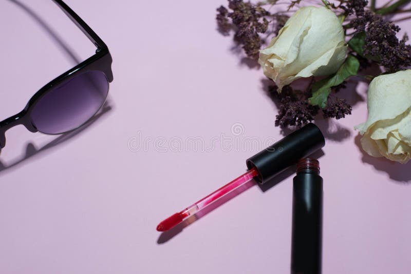 Everything for a woman on a pink background stock photo Everything for a woman on a pink background stock photo