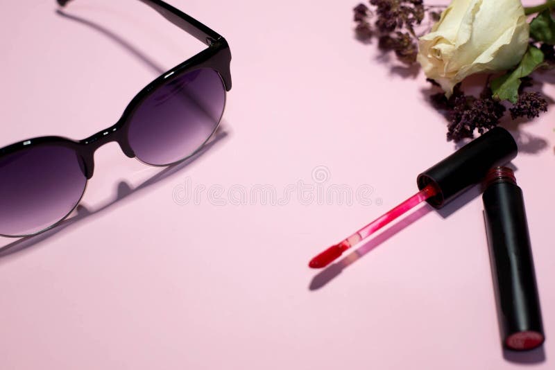 Everything for a woman on a pink background stock photos Everything for a woman on a pink background stock photos
