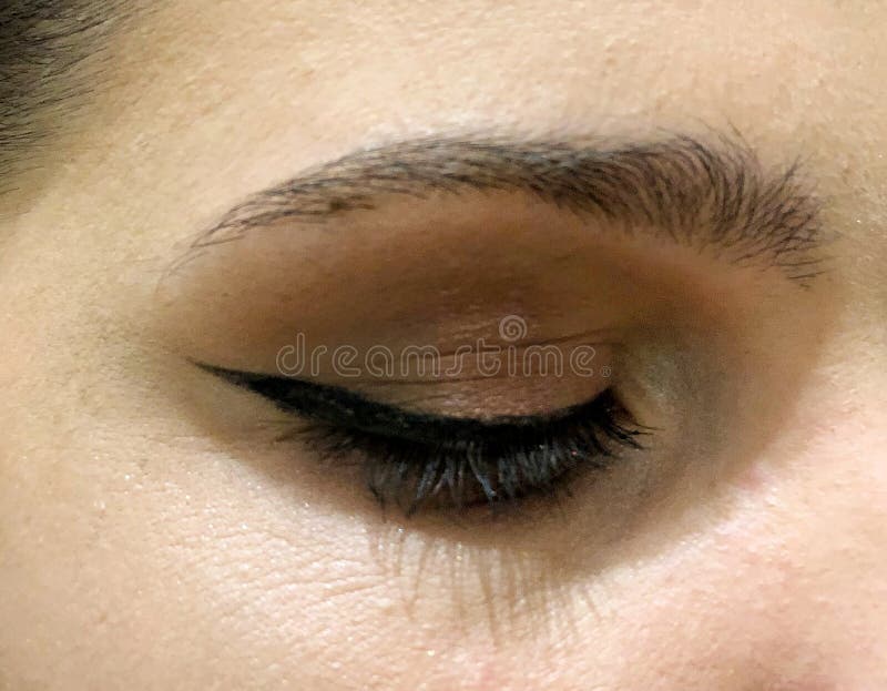 Cosmetics Makeup. Beautiful Female Eye with Black Liner Makeup Stock