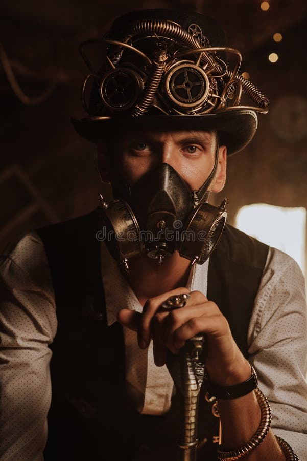 Cosplay De Steampunk. Retrato De Gafas Sombrero De Alto Y Una Máscara De Gas Foto de archivo - Imagen de anteojos, ropas: 226099054