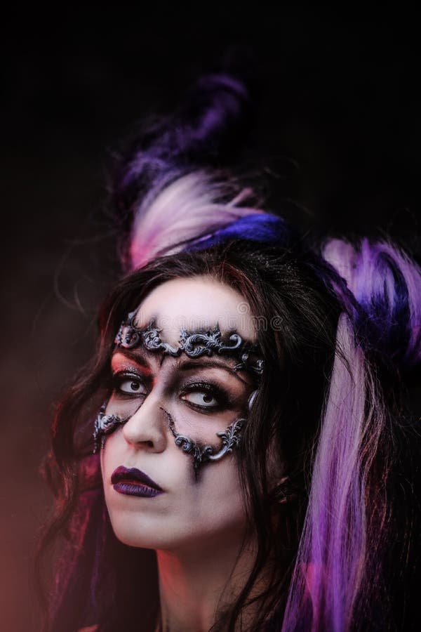 Cosplayer Girl Wearing Dark Demonic Make Up and Horns Posing in a ...