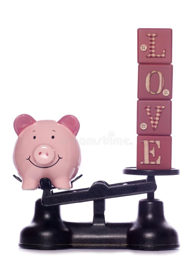 Piggy bank and love letters on weighing scales. Piggy bank and love letters on weighing scales