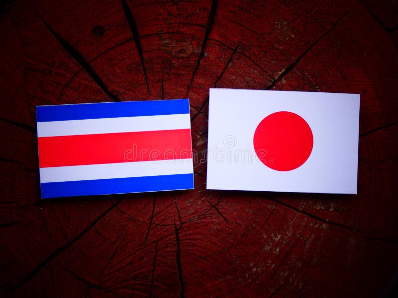 Costa Rican Flag with Japanese Flag on a Tree Stump Isolated Stock Image Image of government