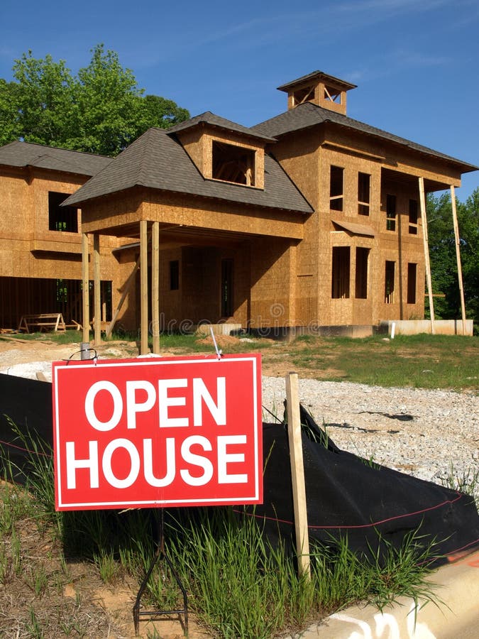 Open House sign in front of home Construction. Open House sign in front of home Construction