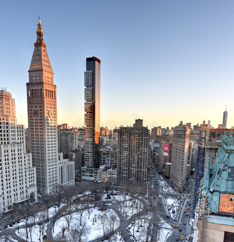 Costruzione e Madison Square Park di ferro da stiro fotografia stock libera da diritti Costruzione e Madison Square Park di ferro da stiro fotografia stock libera da diritti