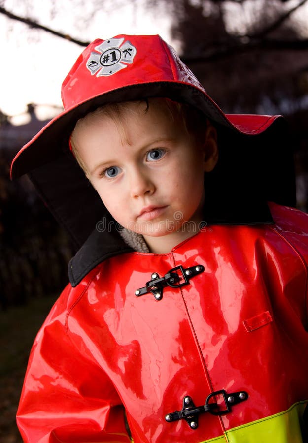 Young child dressed up as fireman for Halloween. Young child dressed up as fireman for Halloween