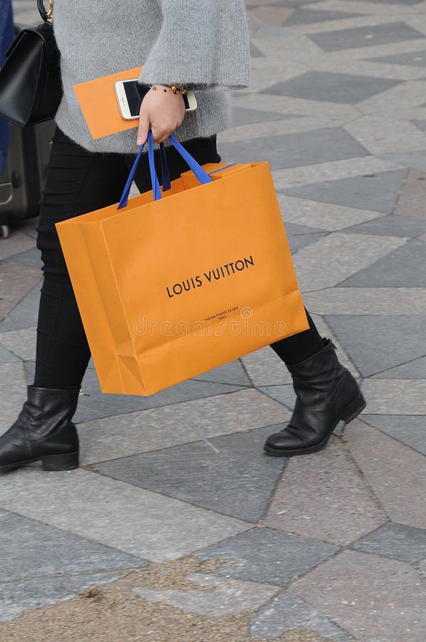 25 May 2023/ Consumers wait at Louis Vuitton store in danish capital  Copenhagen on stroeget pedestrain stree. (Photo.Francis Joseph Dean/Dean  Pictures Stock Photo - Alamy