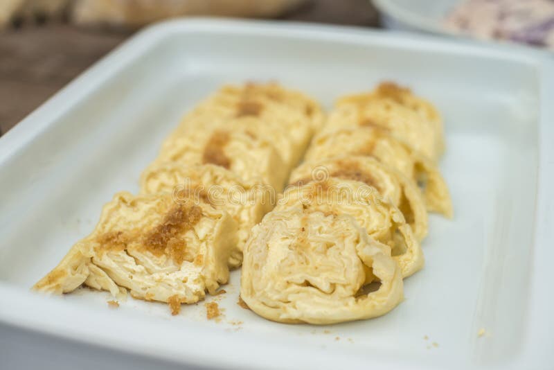 Cottage cheese rolled pastry, typical in Slovenia. Cottage cheese rolled pastry with bread crumbs, roasted in butter, typical in Slovenia royalty free stock photo Cottage cheese rolled pastry, typical in Slovenia. Cottage cheese rolled pastry with bread crumbs, roasted in butter, typical in Slovenia royalty free stock photo