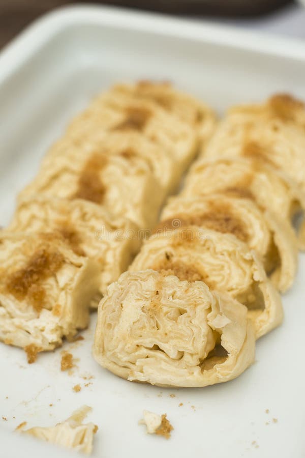 Cottage cheese rolled pastry, typical in Slovenia. Cottage cheese rolled pastry with bread crumbs, roasted in butter, typical in Slovenia royalty free stock photo Cottage cheese rolled pastry, typical in Slovenia. Cottage cheese rolled pastry with bread crumbs, roasted in butter, typical in Slovenia royalty free stock photo