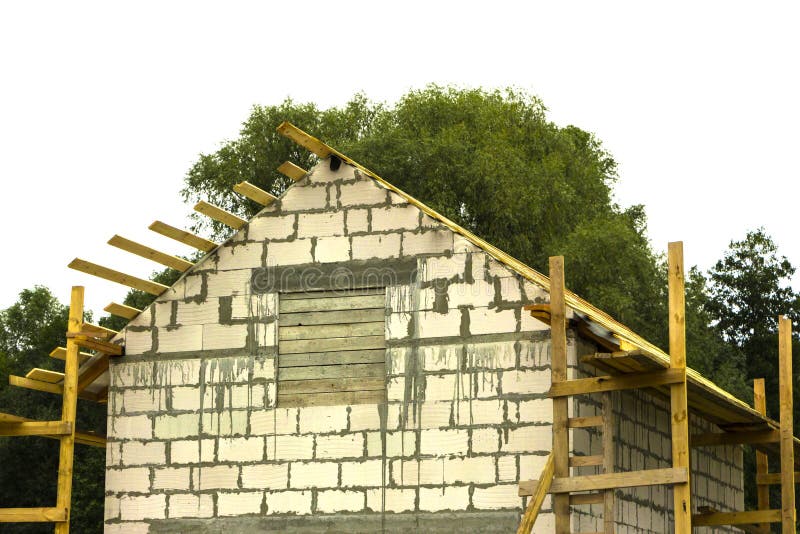 Cottage in the process of construction Wooden arch roof. Roof under construction royalty free stock images Cottage in the process of construction Wooden arch roof. Roof under construction royalty free stock images
