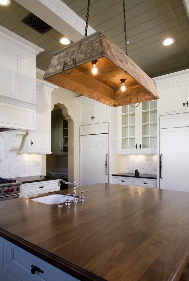 Cottage style home white kitchen royalty free stock image