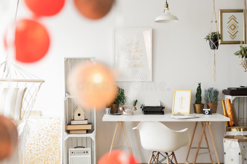 Cotton balls in home office. Orange cotton balls in creative home office royalty free stock images