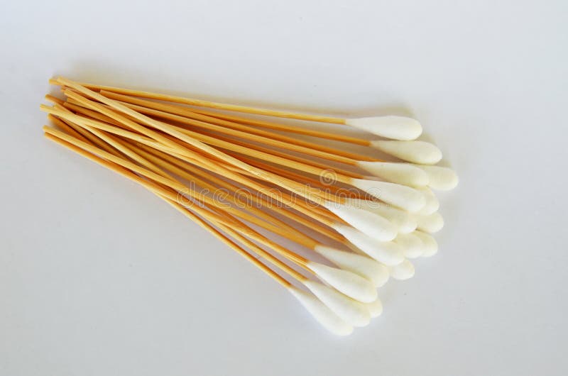 Cotton Bud with Long Wooden Stick on White Background Stock Image